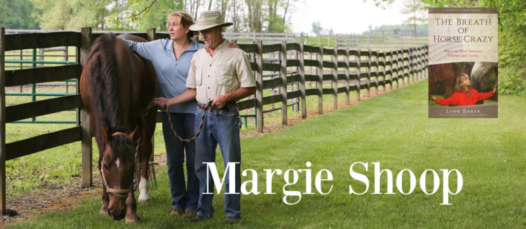 Beautiful grass and wood fencing with grazing horse, a woman, and man in a hat. Book cover "The Breath of Horse Crazy" and the name, Margie Shoop