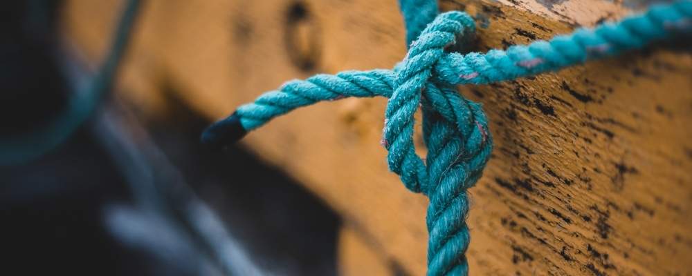 turquoise knot on board
